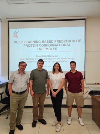 Dilara Önal with the thesis jury after her defense
