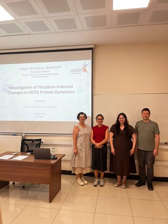 Öyküm Önel with the thesis jury after her defense